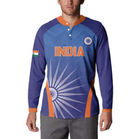 Men's blue cricket button sweatshirt on model with INDIA logo and orange collar trim