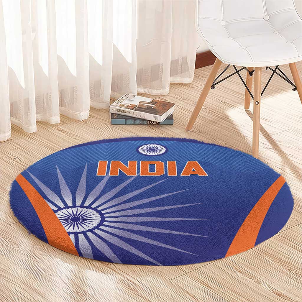 Blue round carpet with INDIA text, central white chakra symbol, and orange side stripes