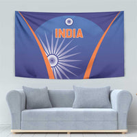 Blue India cricket tapestry above gray sofa, orange border and INDIA emblem