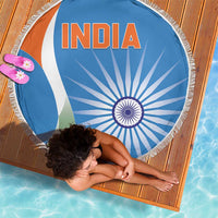Round blue India beach blanket with fringe, INDIA text over tricolor and chakra wheel