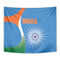 India cricket tapestry close view: blue fabric with orange INDIA text and white wheel rays.