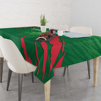 Green tablecloth with red tiger graphic and Bangladesh lettering