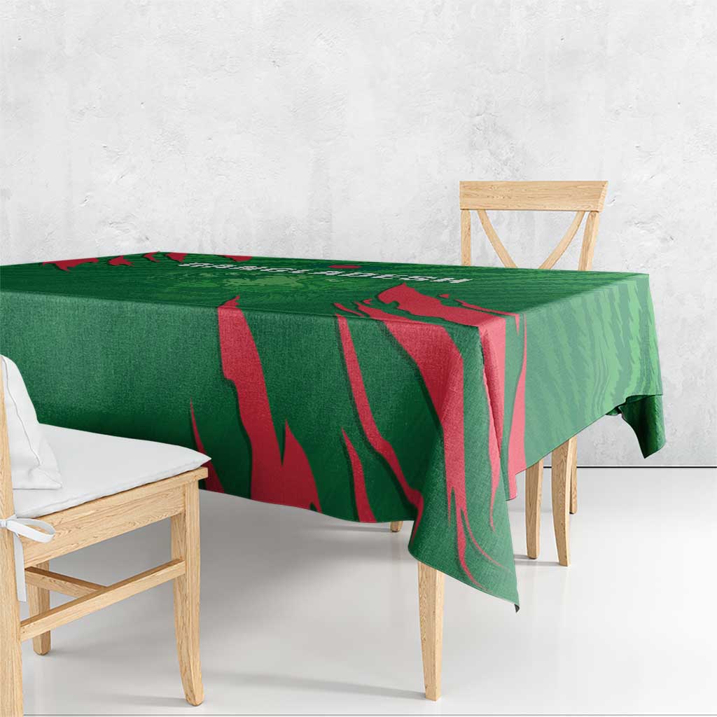 Green cricket tablecloth corner with bold red striped design