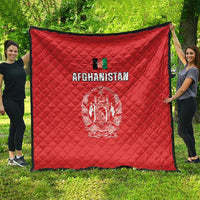 Red Afghanistan flag-style quilt, full front view with Afghanistan text and white emblem