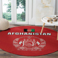 Red circular rug featuring Afghanistan flag-style emblem and 'AFGHANISTAN' title