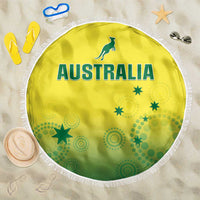 Round yellow beach blanket with green Australia graphic and white fringe edge