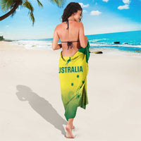 Australia sarong wrap in green and yellow with circular emblem and partial kangaroo print