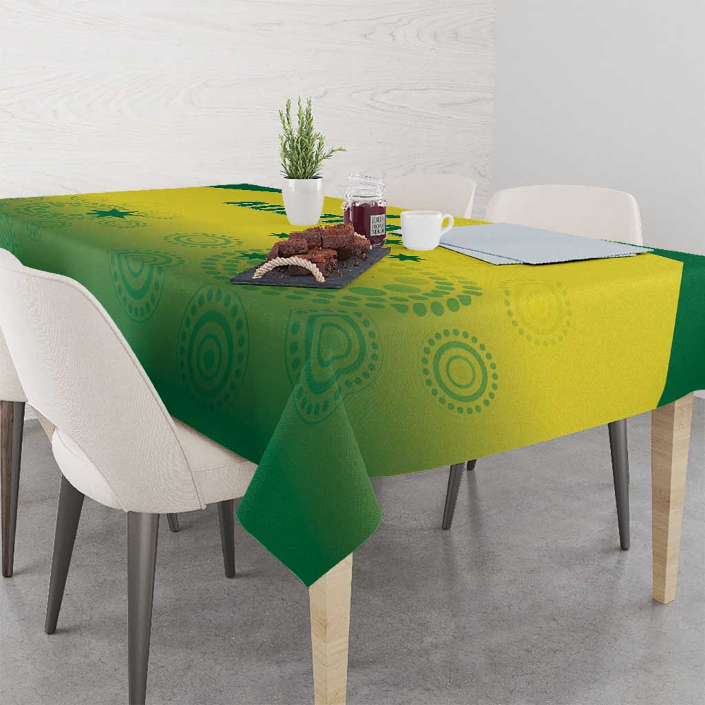 Green and yellow patterned tablecloth with circular motifs on a dining table
