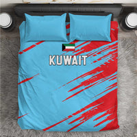 Blue duvet cover with red streak design, 'KUWAIT' text, and matching pillowcases.
