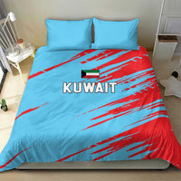 Blue duvet cover with KUWAIT text and red streak pattern, with two matching pillowcases.