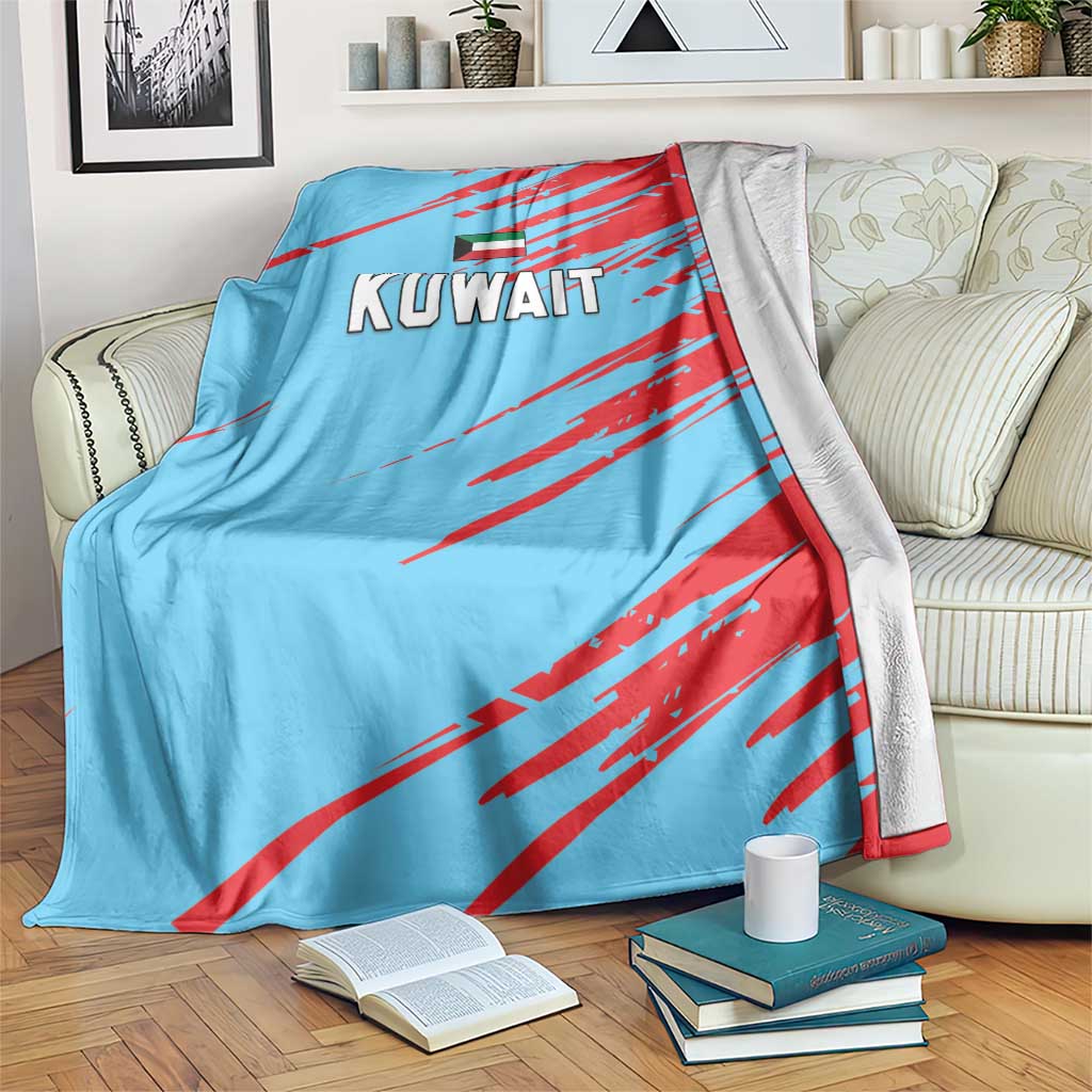 Blue Kuwait cricket blanket with red diagonal stripes, Kuwait text, and flag emblem