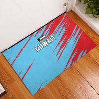 Blue and red Kuwait cricket rubber doormat on wood floor, streak pattern with Kuwait logo