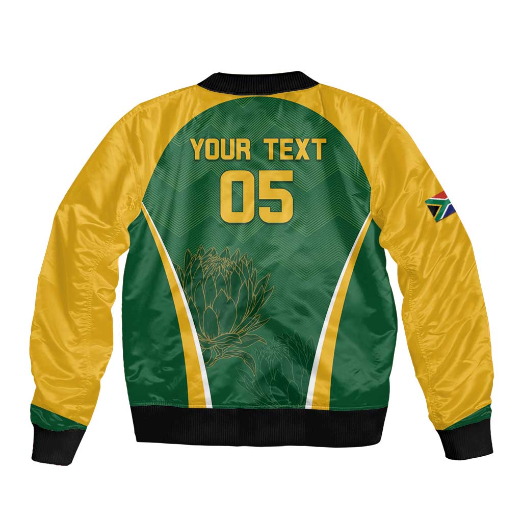 Unisex green cricket bomber jacket back with 'YOUR TEXT 05' and ribbed hem