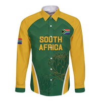 Green and yellow long-sleeve cricket button shirt with South Africa text and flag badge