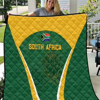 Green and yellow South Africa quilt with centered triangle crest and 'SOUTH AFRICA' text
