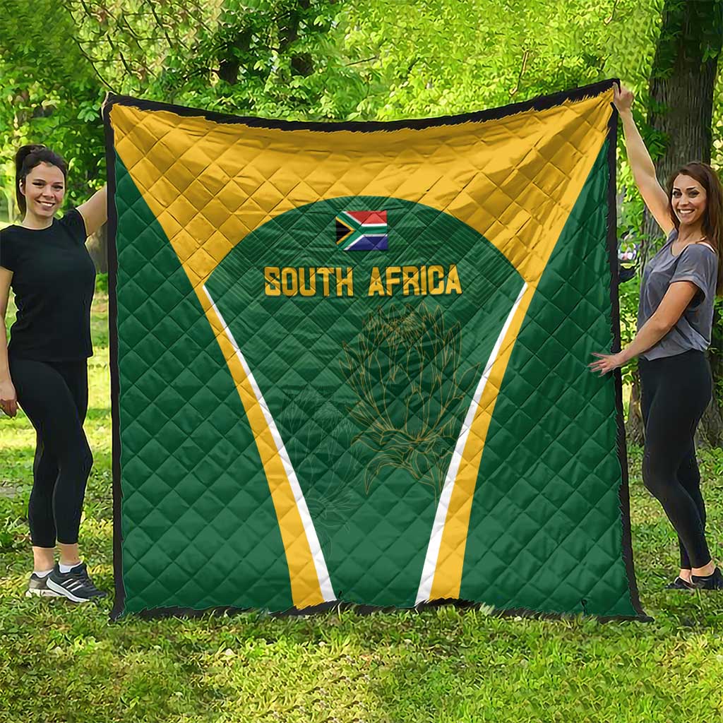 Green and yellow South Africa quilt, large triangle crest with 'SOUTH AFRICA' across the center