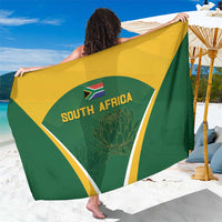 Green sarong with yellow trim and South Africa logo text panel
