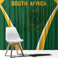 Green South Africa window curtain with gold top, diagonal stripe trim, Protea graphic panel.