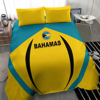 Yellow and teal football bedding set with Bahamas logo on duvet and two yellow pillows