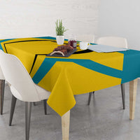 Rectangular Bahamas football tablecloth with teal and yellow geometric stripes and black text.