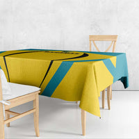 Bahamas football tablecloth with bold yellow and teal pattern and visible hanging edge.