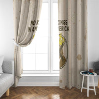 Beige window curtain draped at a window with “NO KINGS IN AMERICA” print