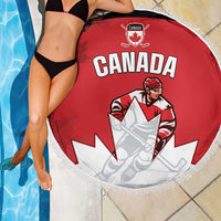 Red round beach blanket with Canada hockey player print and white fringe edge