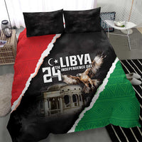 Black duvet and pillows showing Libya 21st Independence Day text, eagle, and flag colors.