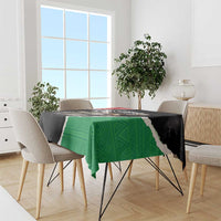 Libya independence day tablecloth draped on dining table, green and black diagonal design