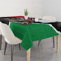 Libya independence day tablecloth on table, green geometric center with black corner