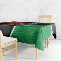 Libya independence day tablecloth draped on table, green patterned section and black border