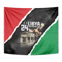 Close-up Libya Independence Day tapestry in red, green, and black with “LIBYA” and “21st”