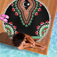 Round black dashiki beach blanket with fringe; decorative floral and geometric border