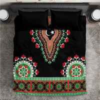 Black bedding set with central dashiki-style lion motif and green/red patterned border