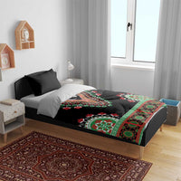 Black duvet bedding set with dashiki lion motif, laid on bed with black pillow shams