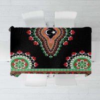 Black dashiki-style tablecloth with green/red ornamental center motif