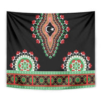 Black tapestry close-up: central crescent moon and repeating green-red pattern border