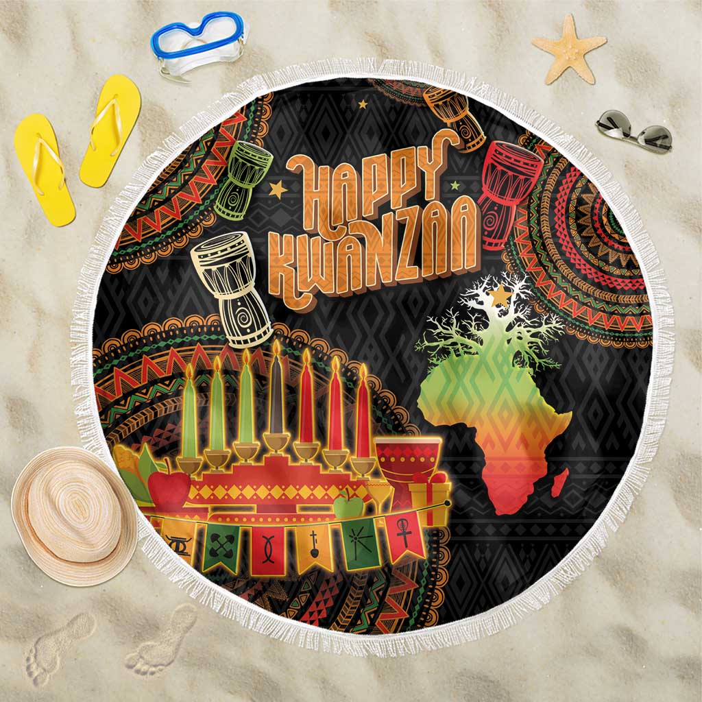 Round beach blanket with black tribal design, Happy Kwanzaa text, kinara candles, Africa map.
