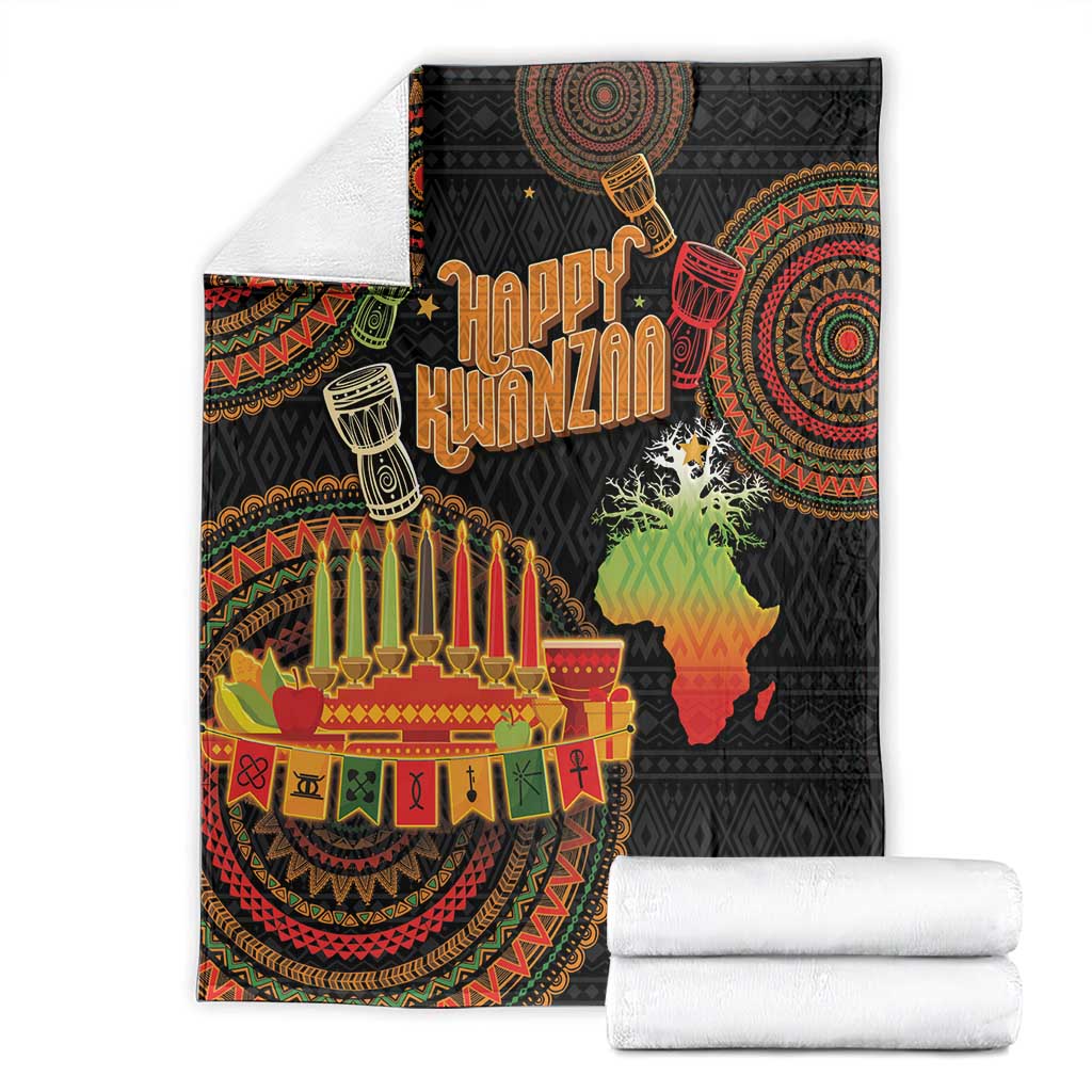 Black Happy Kwanzaa throw blanket folded with menorah candles and African map on black background