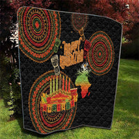 Black Kwanzaa quilt with quilted diamonds, circular medallion motifs, “Happy Kwanzaa,” candle art