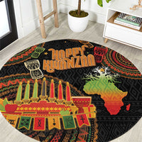 Round black Kwanzaa patterned carpet with candles, Kinara and map graphic