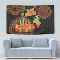 Black tapestry showing Happy Kwanzaa lettering, menorah candles, and Africa silhouette