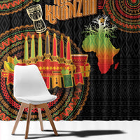 Black curtain with large circular African tribal design and gold candleholder graphic