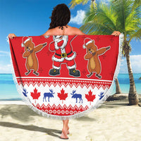 Round red Christmas beach blanket with fringe, Merry Christmas text with Santa and reindeer icons.