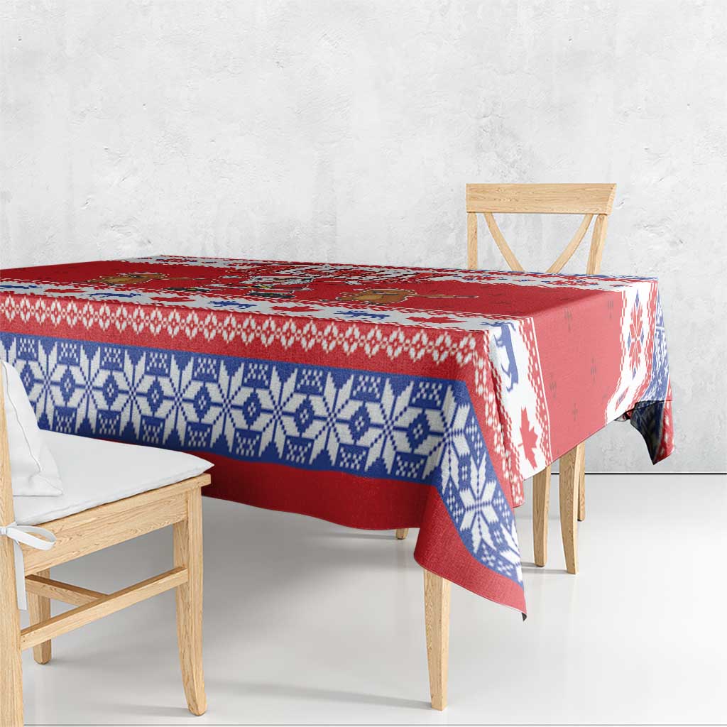 Red holiday tablecloth with blue patterned stripe along the table edge