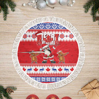 Red circular tree skirt with white fringe, Merry Christmas, dabbing Santa and animal figures