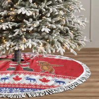 Red round Christmas tree skirt with white fringe and holiday animal and Santa border design