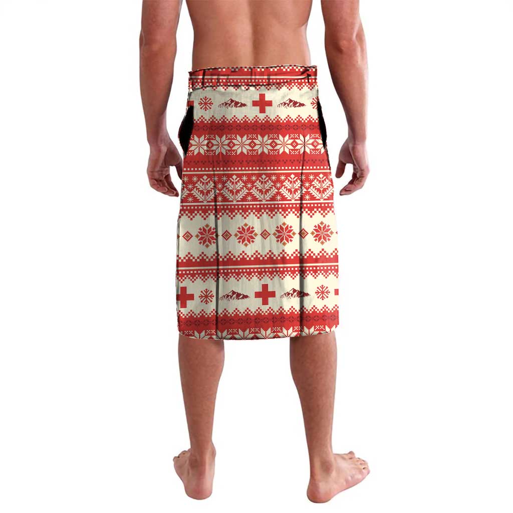 Red and white sarong skirt with patterned rows of crosses and snowflakes
