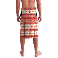 Red and white sarong skirt with patterned rows of crosses and snowflakes