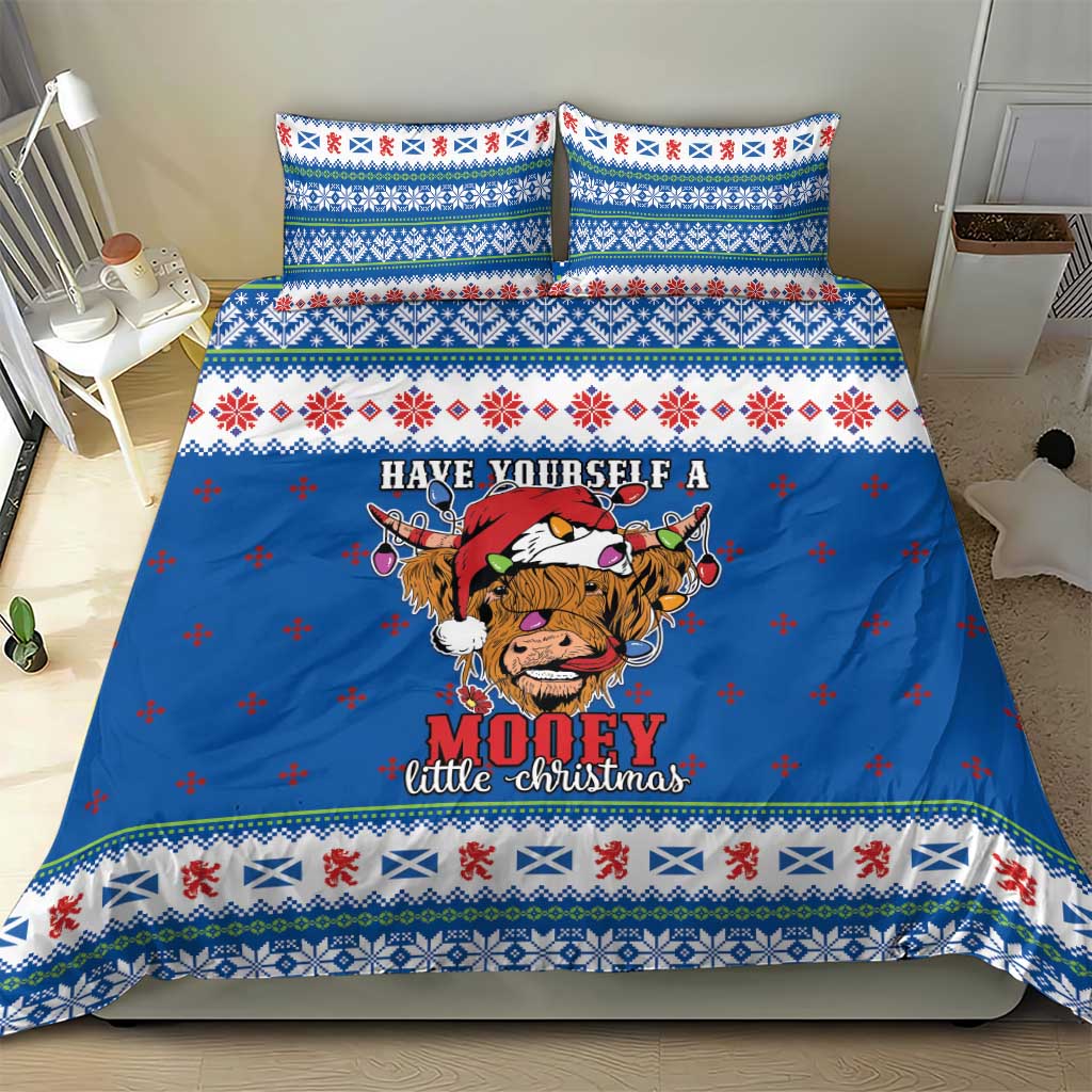 Blue Christmas bedding set with two matching pillow covers and Highland cow center print